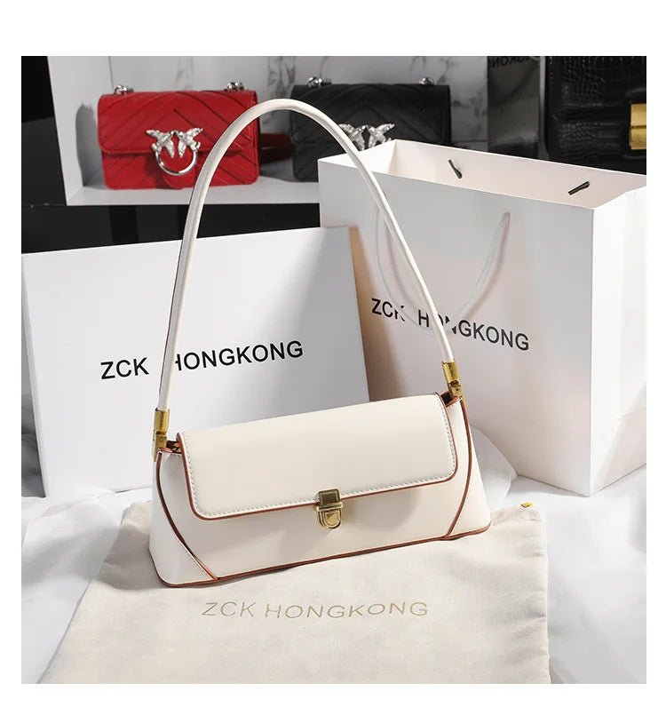 Armpit bag retro niche design high-end solid color one-shoulder portable genuine leather women's bag spring and summer versatile 