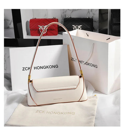 Armpit bag retro niche design high-end solid color one-shoulder portable genuine leather women's bag spring and summer versatile 