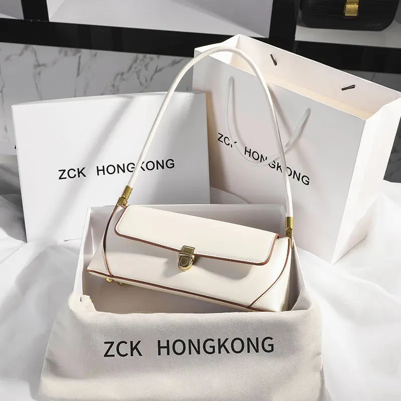 Armpit bag retro niche design high-end solid color one-shoulder portable genuine leather women's bag spring and summer versatile 