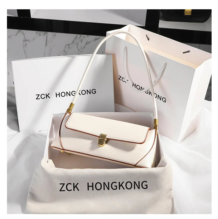 Armpit bag retro niche design high-end solid color one-shoulder portable genuine leather women's bag spring and summer versatile 